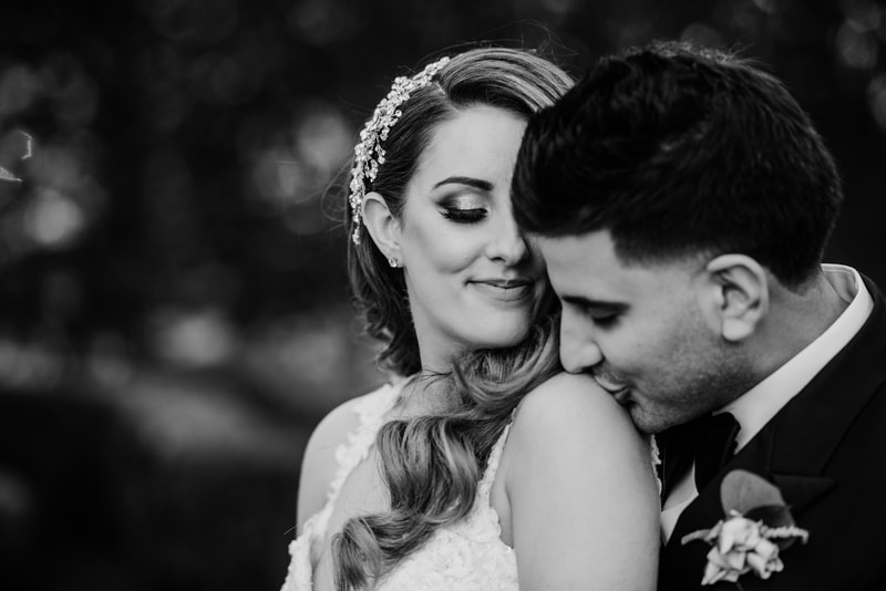 Black and white shoulder kiss wedding photography