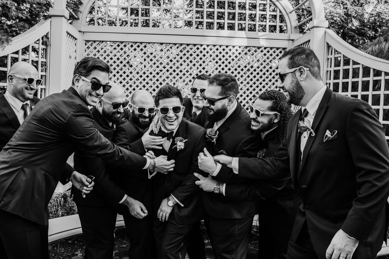black and white Groom and Groomsmen with sunglasses